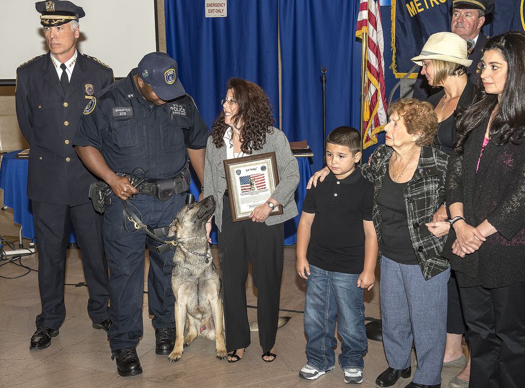 MTA Police Officer Jason Wharton, Mikey and the family of late MTA Police Officer Michael Aurisano